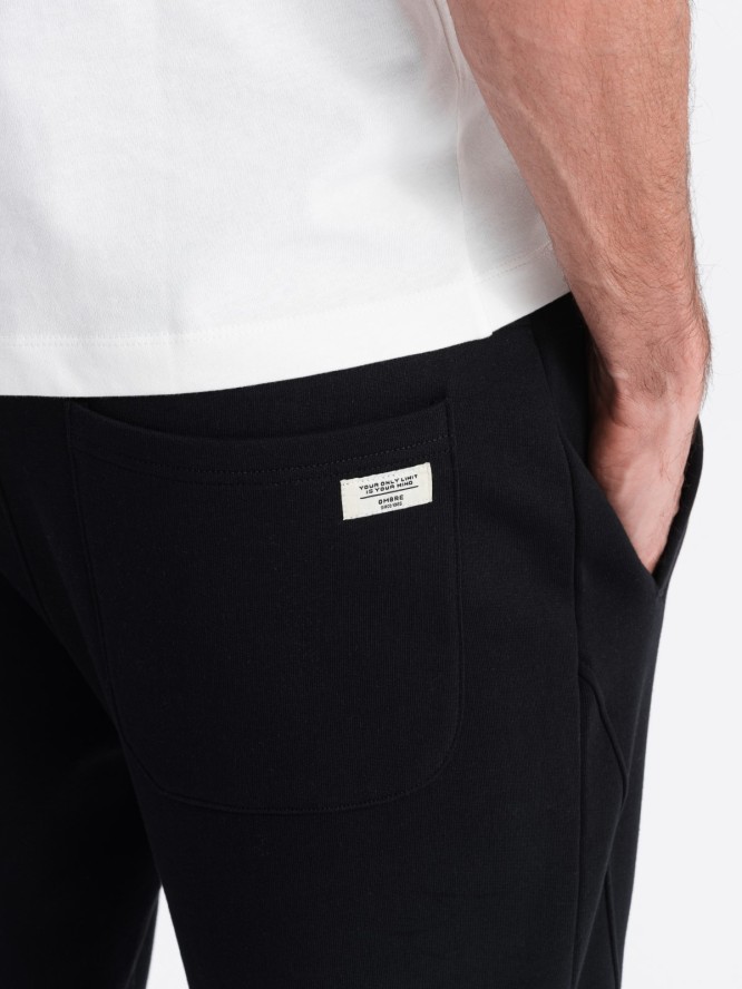 Męskie spodnie dresowe typu jogger - czarne V5 OM-PABS-0173 - XXL