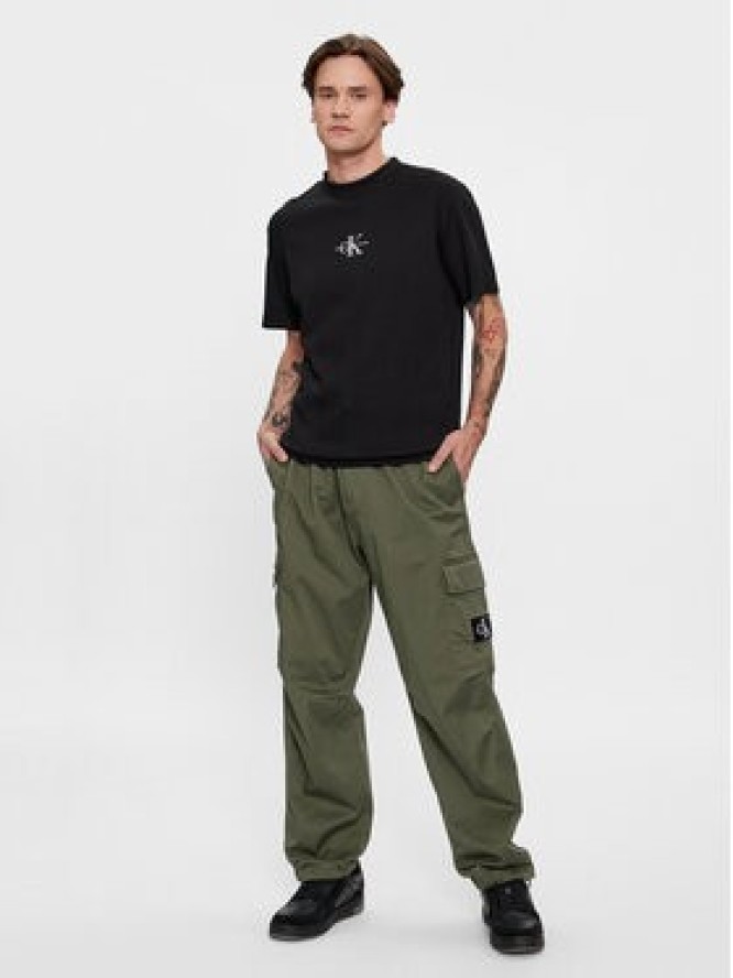 Calvin Klein Jeans Spodnie materiałowe Essential J30J324537 Zielony Regular Fit