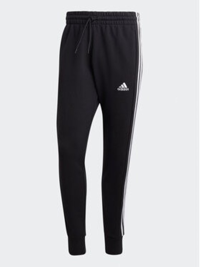 adidas Spodnie dresowe Essentials French Terry Tapered Cuff 3-Stripes Joggers HA4337 Czarny Regular Fit