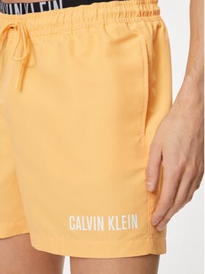 Calvin Klein Swimwear Szorty kąpielowe KM0KM00992 Pomarańczowy Regular Fit