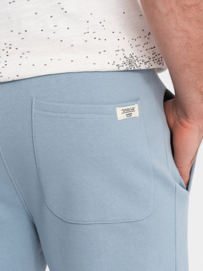 Dresowe spodnie męskie z nogawką bez ściągacza - jasnoniebieskie V7 OM-PABS-0206 - XXL