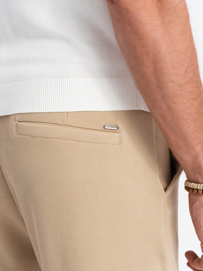 Spodnie męskie dzianinowe z gumką w pasie - piaskowe V3 OM-PACP-0121 - XL